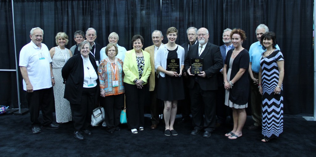The first YES FOUNDATION grant recipients, Megan Alstott and David Provost of the Walker Career Center, receive their awards at THE NBM B.I.G. SHOW in Indianapolis in June 2015.
